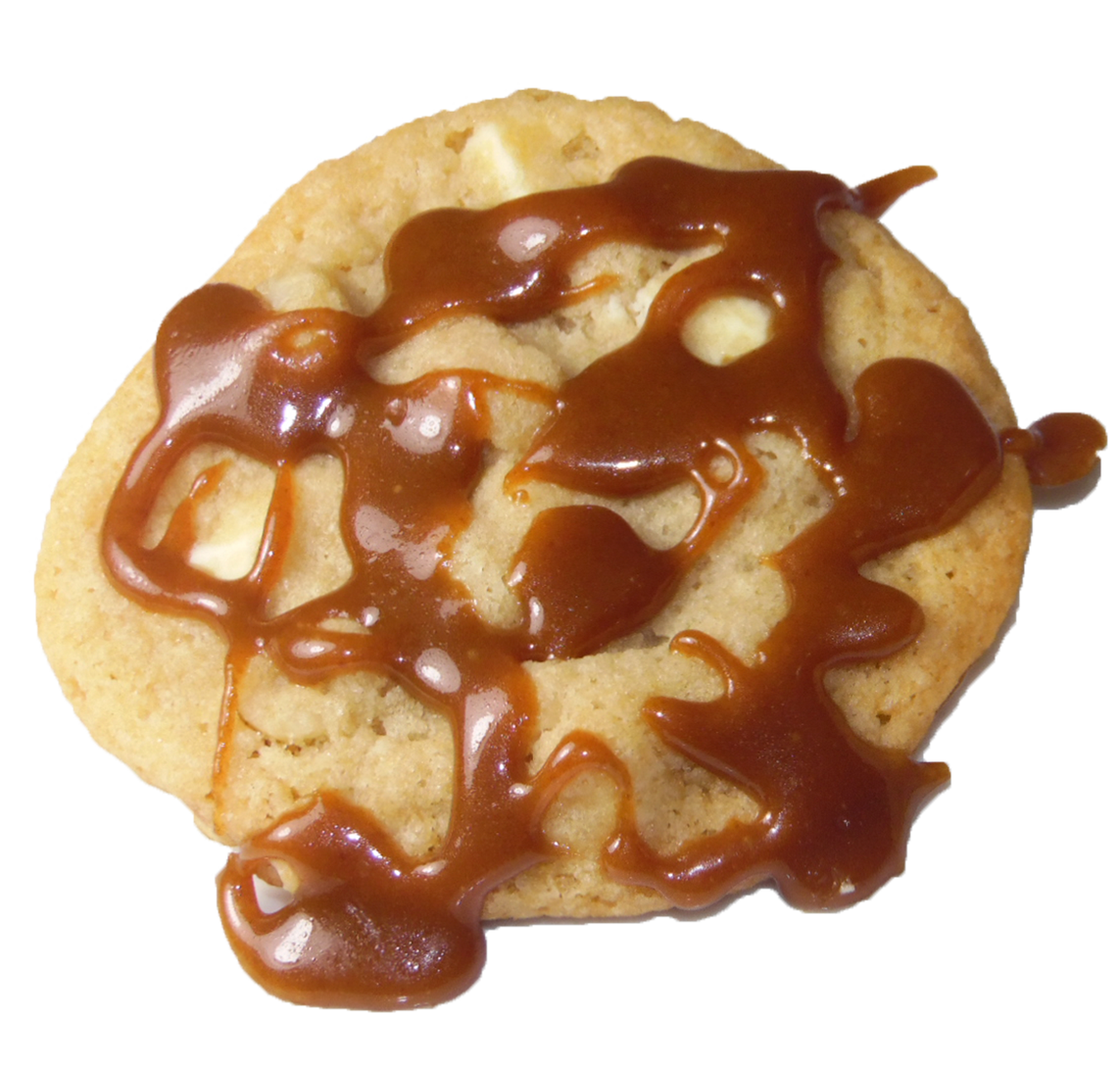 Buttery White Chocolate Chunk Cookie with chopped Macadamia Nuts and Homemade Caramel Drizzle